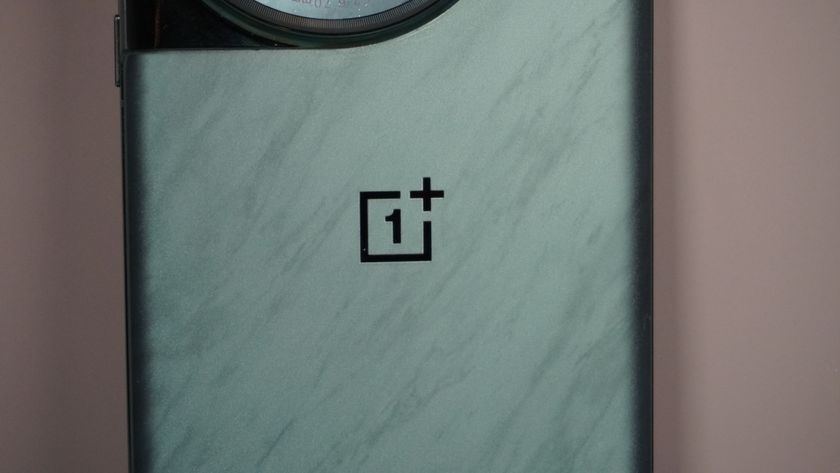 The OnePlus 12 on a grey background