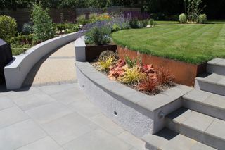 accessible garden design: path and ramp up to a lawn