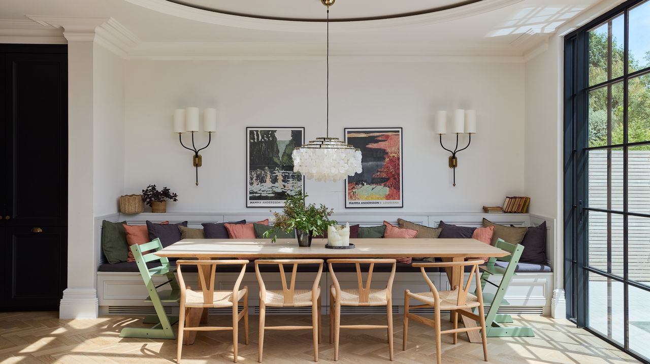 kitchen dining room with large chandelier over kitchen table by Imperfect Interiors
