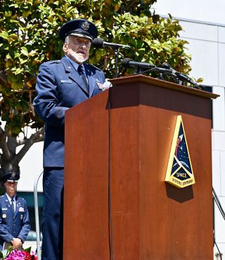 Retired Brig. Gen. Buzz Aldrin addresses the crowd during his honorary promotion ceremony at Space Systems Command in Los Angeles on May 5, 2023.