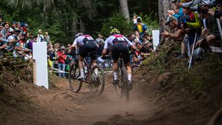 Nino Schurter and Mathias Fluckiger battle it out for a nations pride