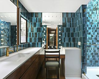 bathroom with tiles wall and mirror