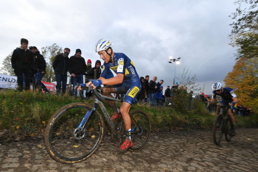 OUDENAARDE BELGIUM NOVEMBER 01 Tom Meeusen of Belgium and Team DeschachtGroup HensContainers Maes competes during the 32nd Koppenbergcross Grand Prix Jolien Verschueren 2021 Mens Elite Koppenbergcross Oudenaarde X2OBadkamersTrofee on November 01 2021 in Oudenaarde Belgium Photo by Luc ClaessenGetty Images