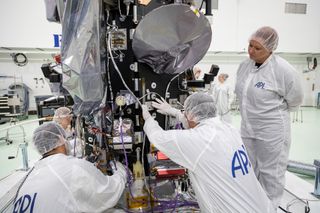 A plaque containing a memory card with more than 1.1 million names is mounted below Parker Solar Probe's high-gain antenna (the round object with gray covering), which the spacecraft will use to transmit data back to Earth.