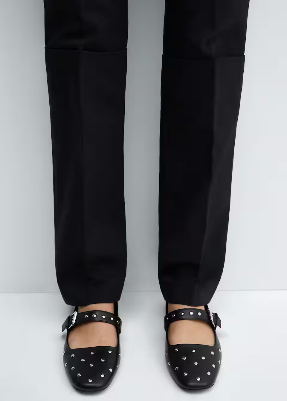 black Mary Jane flats with silver studs