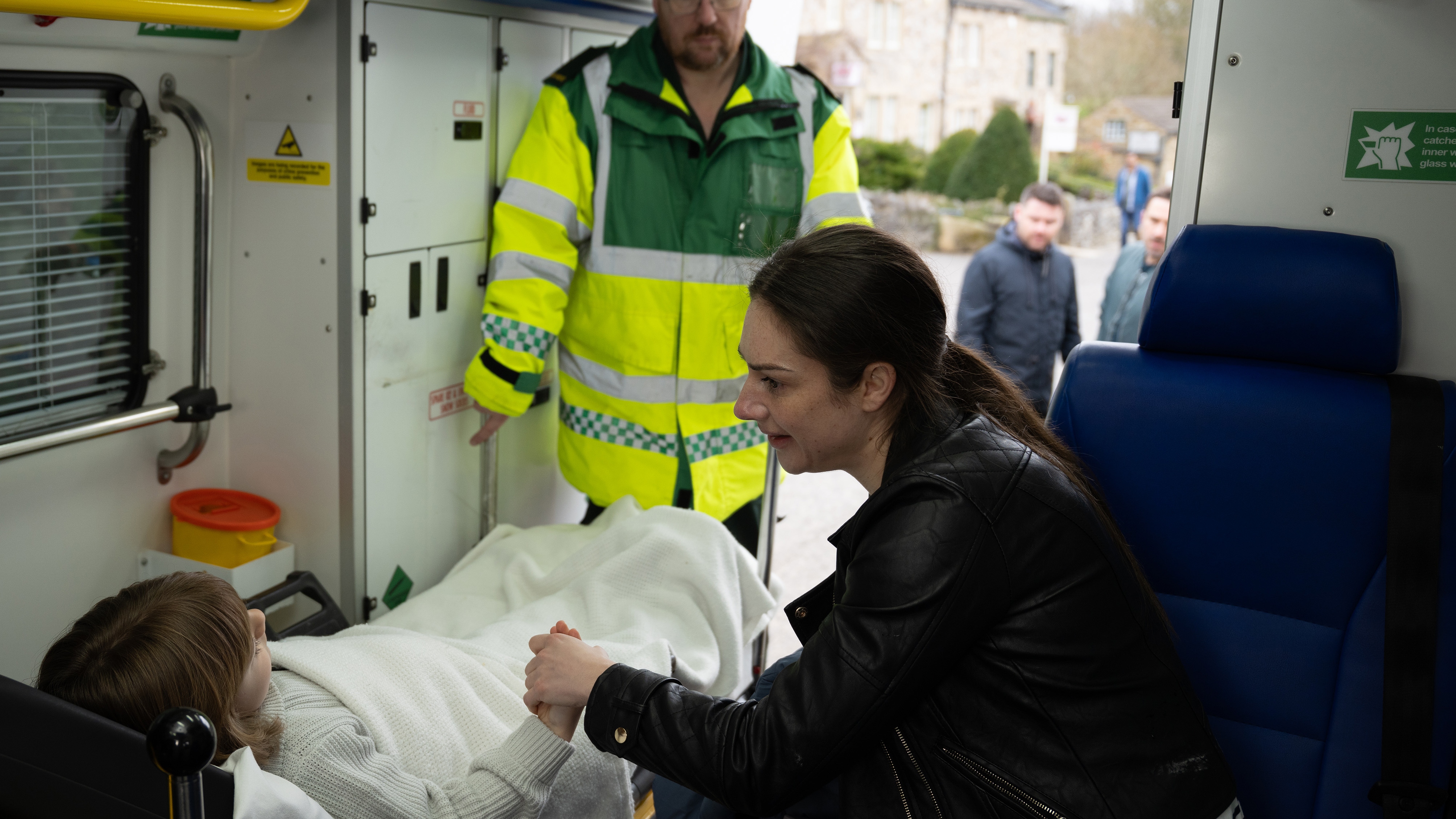 Victoria with Harry in the back of an ambulance