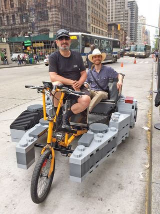 New York City pedicab driver and "Star Wars" fan Lee Buckman gives Space.com's Harrison Tasoff a ride in a brick-built Lego Millennium Falcon pedicab on Star Wars Day 2018.