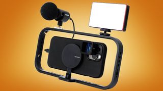 An iPhone mounted inside the Moment Mobile Filmmaker Cage