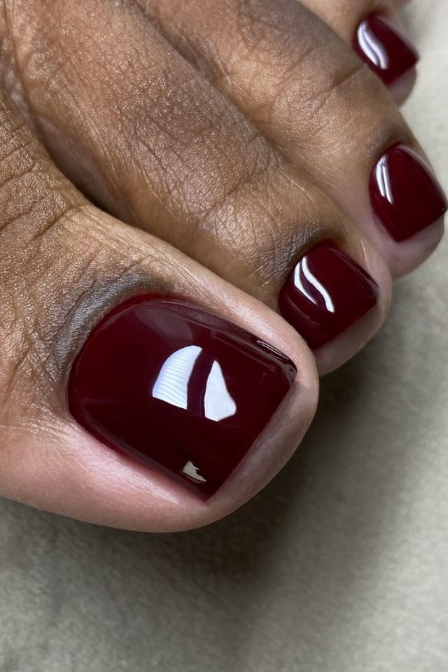 @bombshellnailslondon red pedicure designs