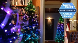 Twinkly smart Christmas tree with holiday badge nearby.
