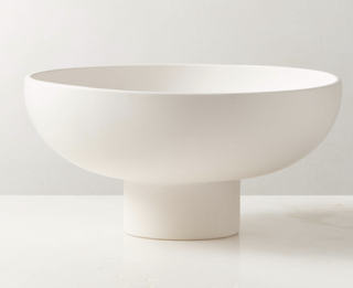 footed white fruit bowl