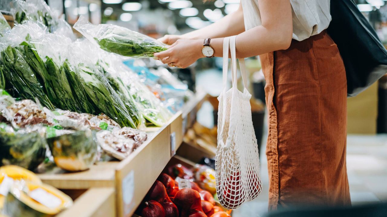 Woman shopping for low calorie filling foods