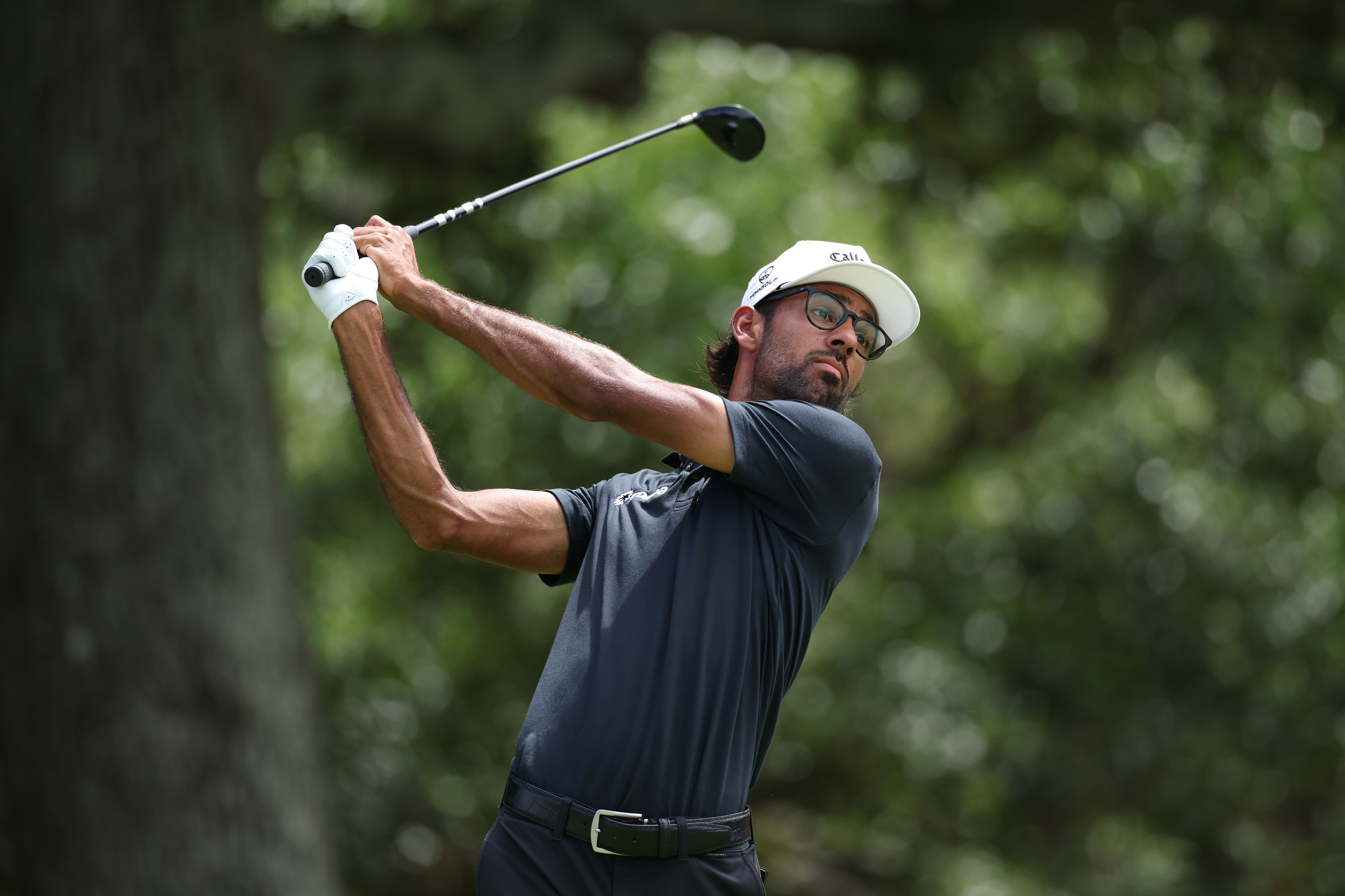 Akshay Bhatia hits a driver