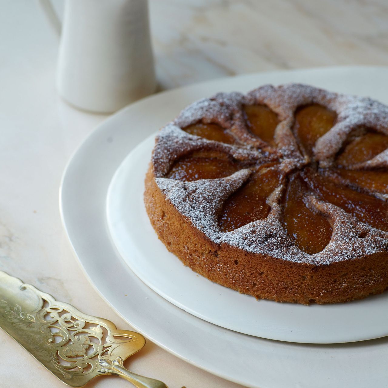 Caramelised pear and buckwheat pudding cake photo