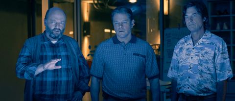Matthew Maher, Matt Damon, and Jason Bateman bathed in blue light as they look onward in Air.