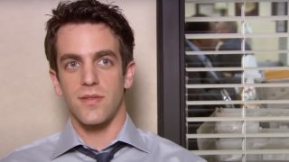 Ryan talking to the camera in the office