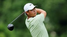 Tom Kim hits driver during the third round of the 2024 Travelers Championship