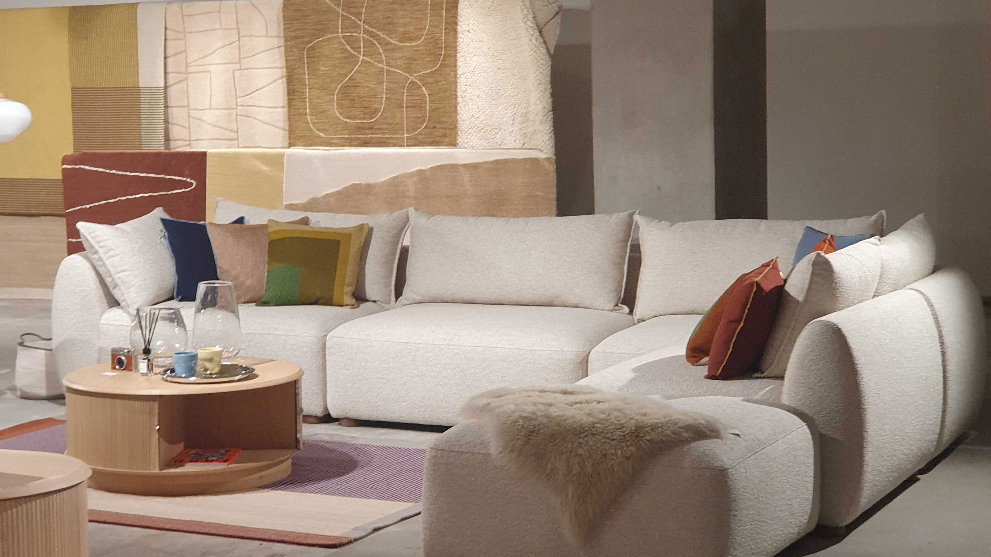 Sofa at John Lewis show in white with cushions