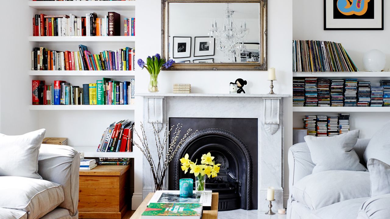 white living room with wooden flooring