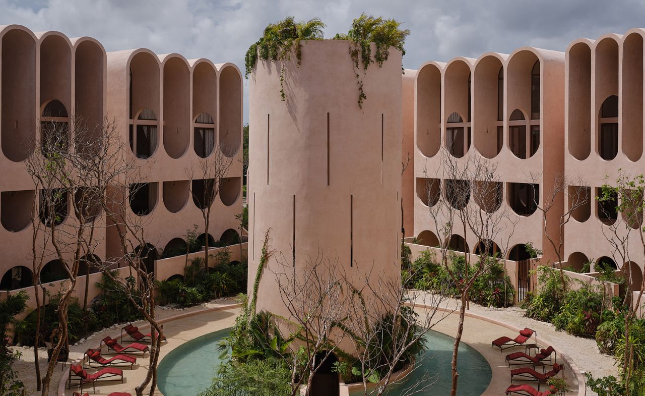 The Babel Tulum holiday apartment retreat is built from a plaster that closely resembles chukum (a traditional Mayan material), its earthy, pinkish colour adding a sense of softness