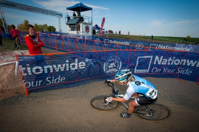 An Eleven rider makes her way through a series of tight and gravelly turns during the final lap at the Colorado Cross Classic.