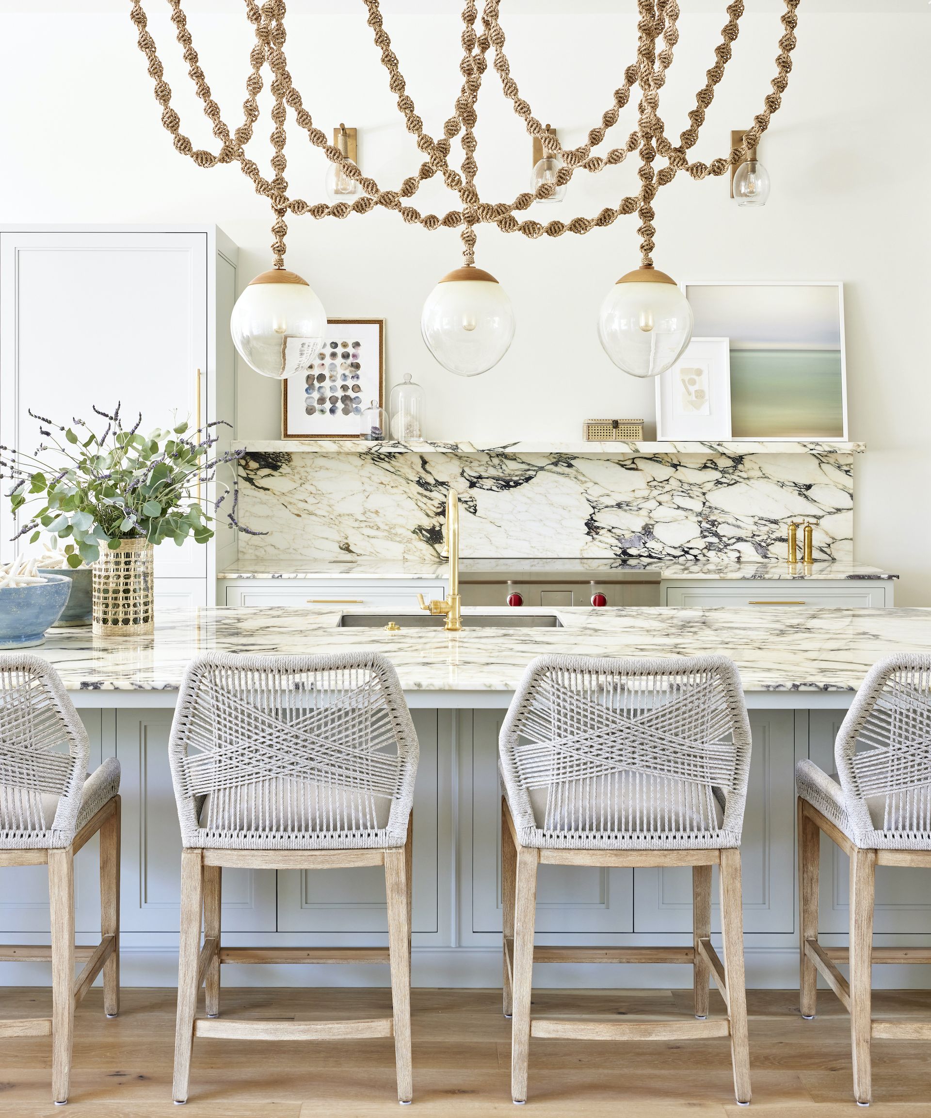 blue and white kitchen with massive lights