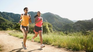 Women running on a trail is a way how to prevent blood clots
