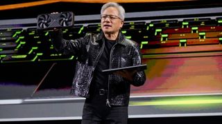 Nvidia CEO with GeForce RTX 50-series GPU
