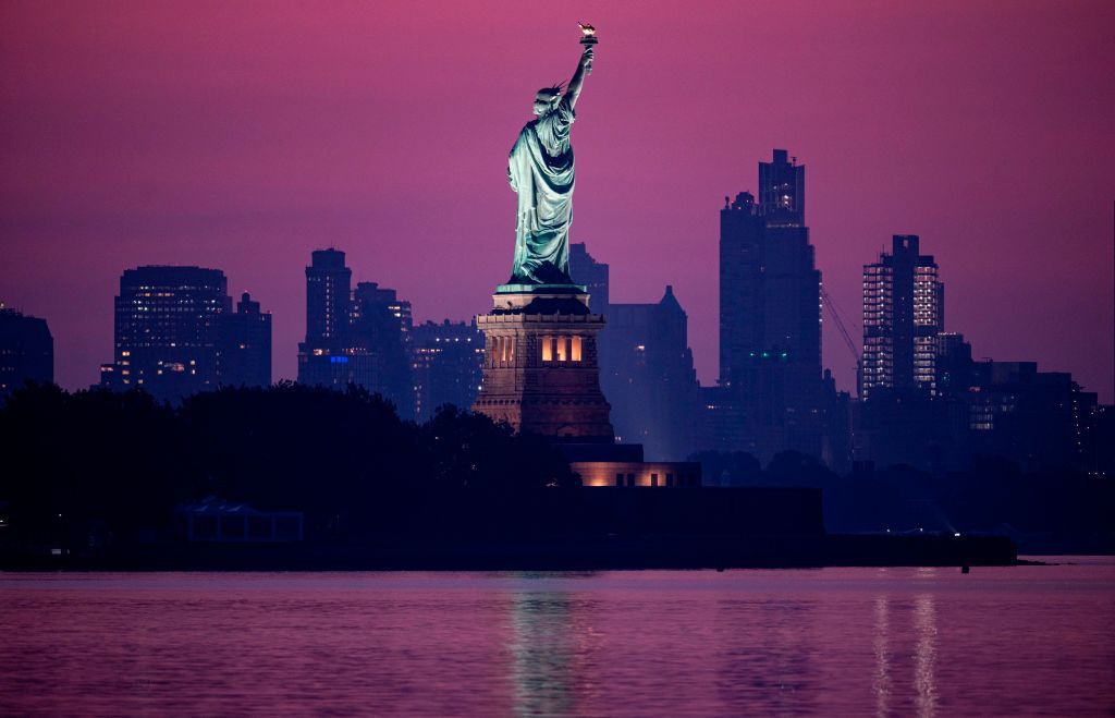 The Statue of Liberty at sunset.