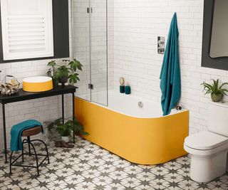 yellow shower bath in bathroom with star patterned floor tiles and yellow basin