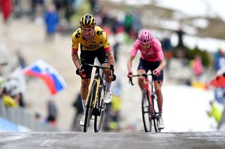 TRE CIME DI LAVAREDO ITALY MAY 26 LR Primo Rogli of Slovenia and Team JumboVisma and Geraint Thomas of The United Kingdom and Team INEOS Grenadiers Pink Leader Jersey spduring the 106th Giro dItalia 2023 Stage 19 a 183km stage from Longarone to Tre Cime di Lavaredo 2307m UCIWT on May 26 2023 in Tre Cime di Lavaredo Italy Photo by Stuart FranklinGetty Images