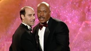 Stanley Tucci and Ving Rhames on stage together.