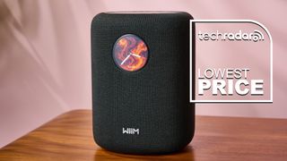 WiiM Sound, on pink background, with TR's 'Lowest Price' badge 