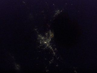 This night view from space shows city lights of Sendai, Japan, in 2003, before the destructive earthquake and tsunami of March 11, 2011. One of the Expedition 6 crew members onboard the International Space Station took this picture, 220 miles above the Ea