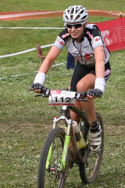 Peta Mullens finishes in second with a smile.