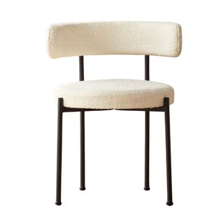 White boucle dining chair with black frame