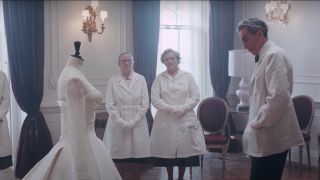 Daniel Day Lewis reviewing a dress in Phantom Thread.
