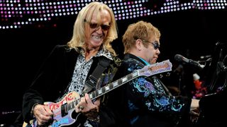 Davey Johnstone (left) and Elton John perform at Citizens Business Bank Arena in Ontario, California, November 5, 2010