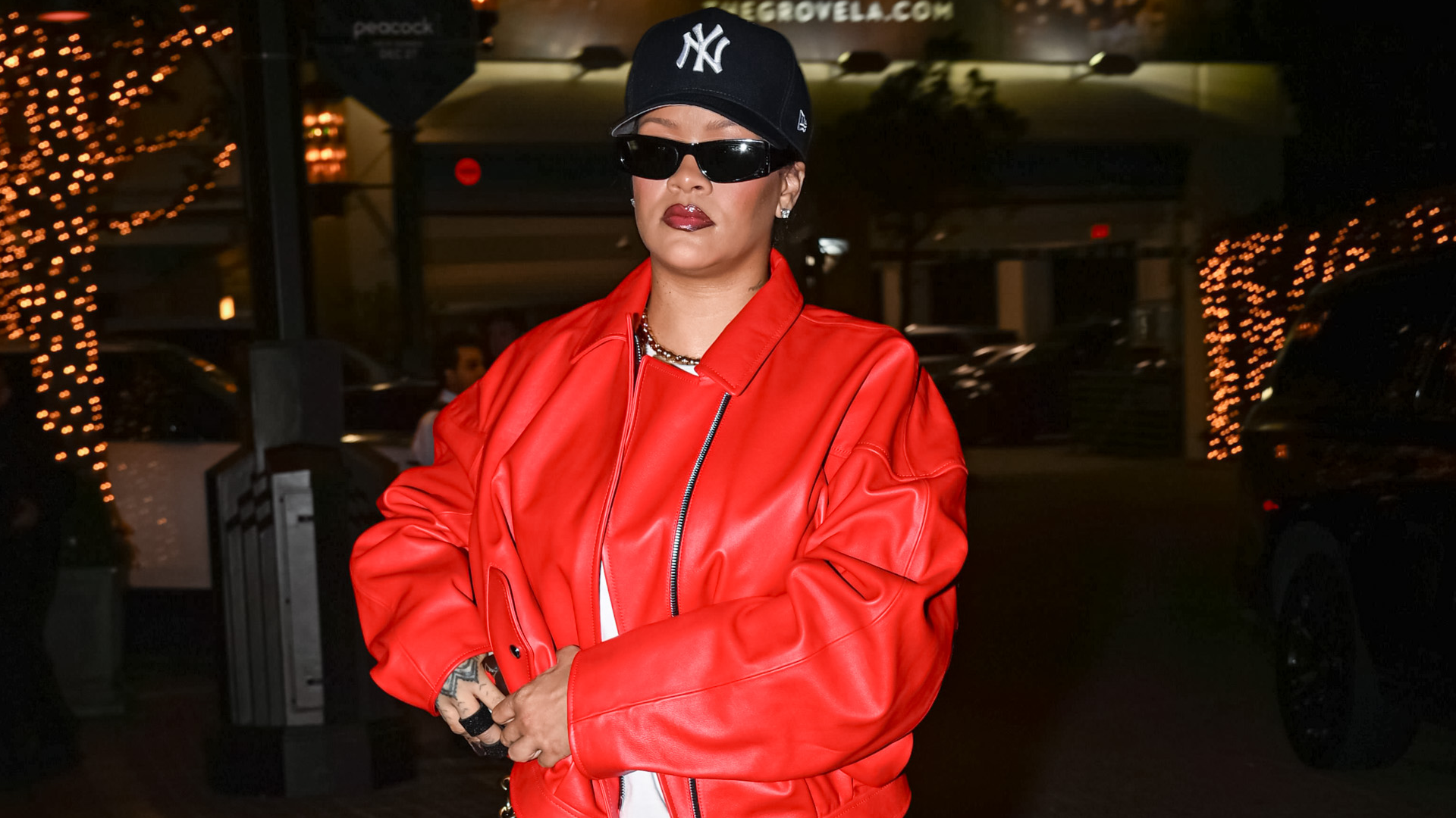 Rihanna ran errands in L.A. while wearing a red leather bomber jacket and python pumps