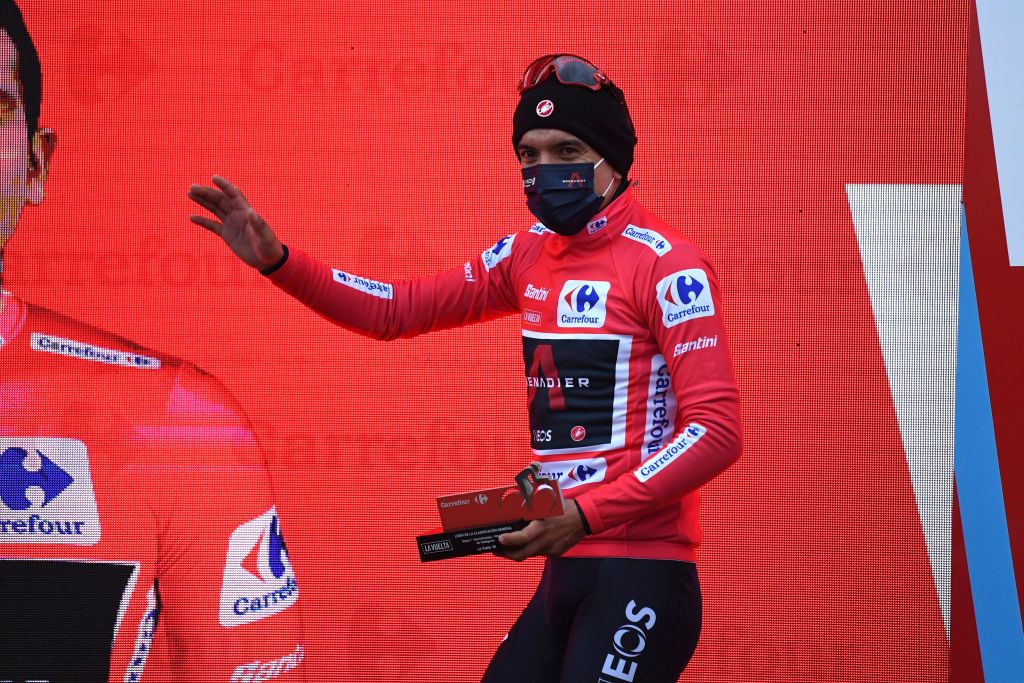 VILLANUEVA DE VALDEGOVIA SPAIN OCTOBER 27 Podium Richard Carapaz of Ecuador and Team INEOS Grenadiers Red Leader Jersey Celebration Trophy during the 75th Tour of Spain 2020 Stage 7 a 1597km from VitoriaGasteiz to Villanueva de Valdegovia lavuelta LaVuelta20 La Vuelta on October 27 2020 in Villanueva de Valdegovia Spain Photo by David RamosGetty Images
