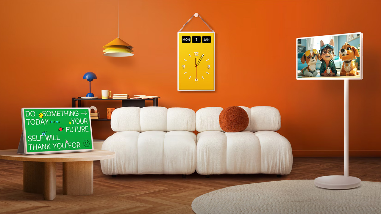 A lifestyle shot of the LG StanByME 2 in a brightly decorated room. The TV is on its stand showing what looks like Paw Patrol or a similar kids' TV programme