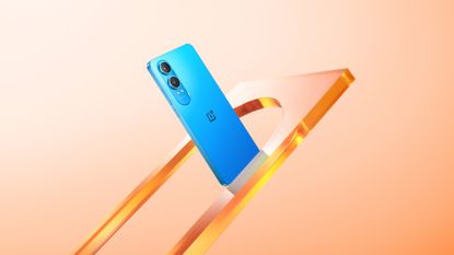 The OnePlus Nord CE4 Lite in blue on an orange background