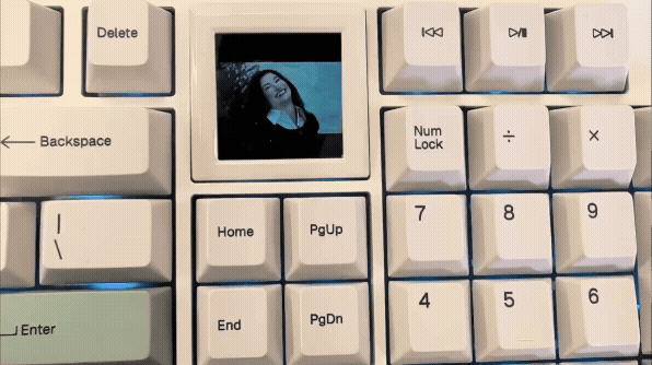A white Epomaker RT100 Pro wireless mechanical keyboard