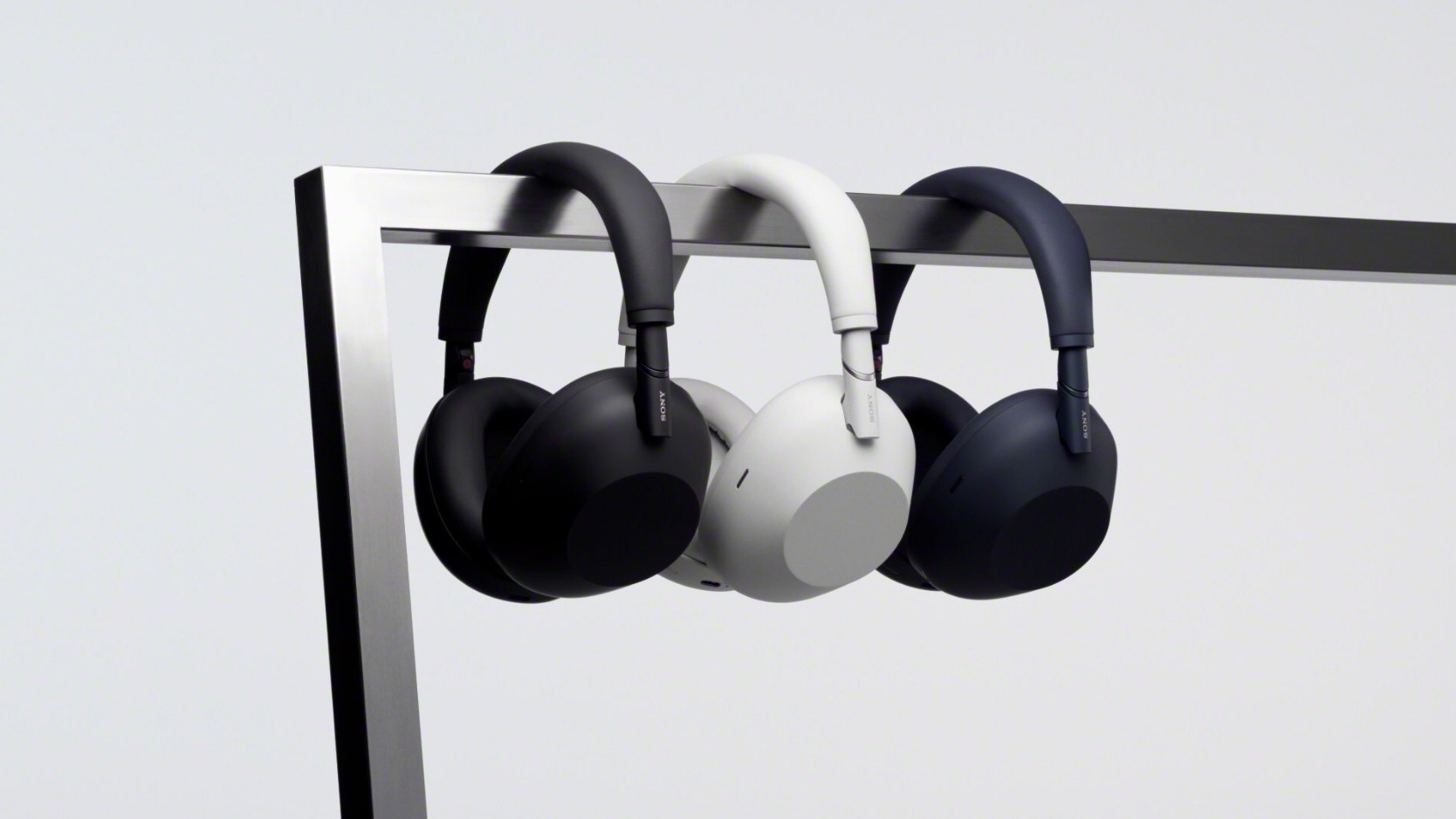 Sony's newest noise-cancelling headphones in silver, black, and blue.