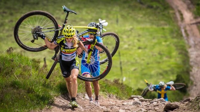 Sally Bigham hikes her bike