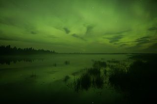 Aurora over Whirlpool Lake, Riding Mountain National Park, Manitoba, Canada, August 2011