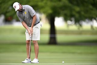 LIV Golf player Marc Leishman hitting a putt