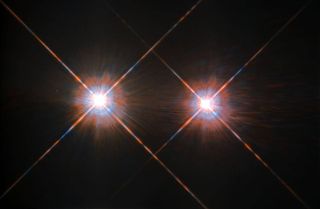 A Hubble Space Telescope image of Alpha Centauri A (left) and Alpha Centauri B (right).