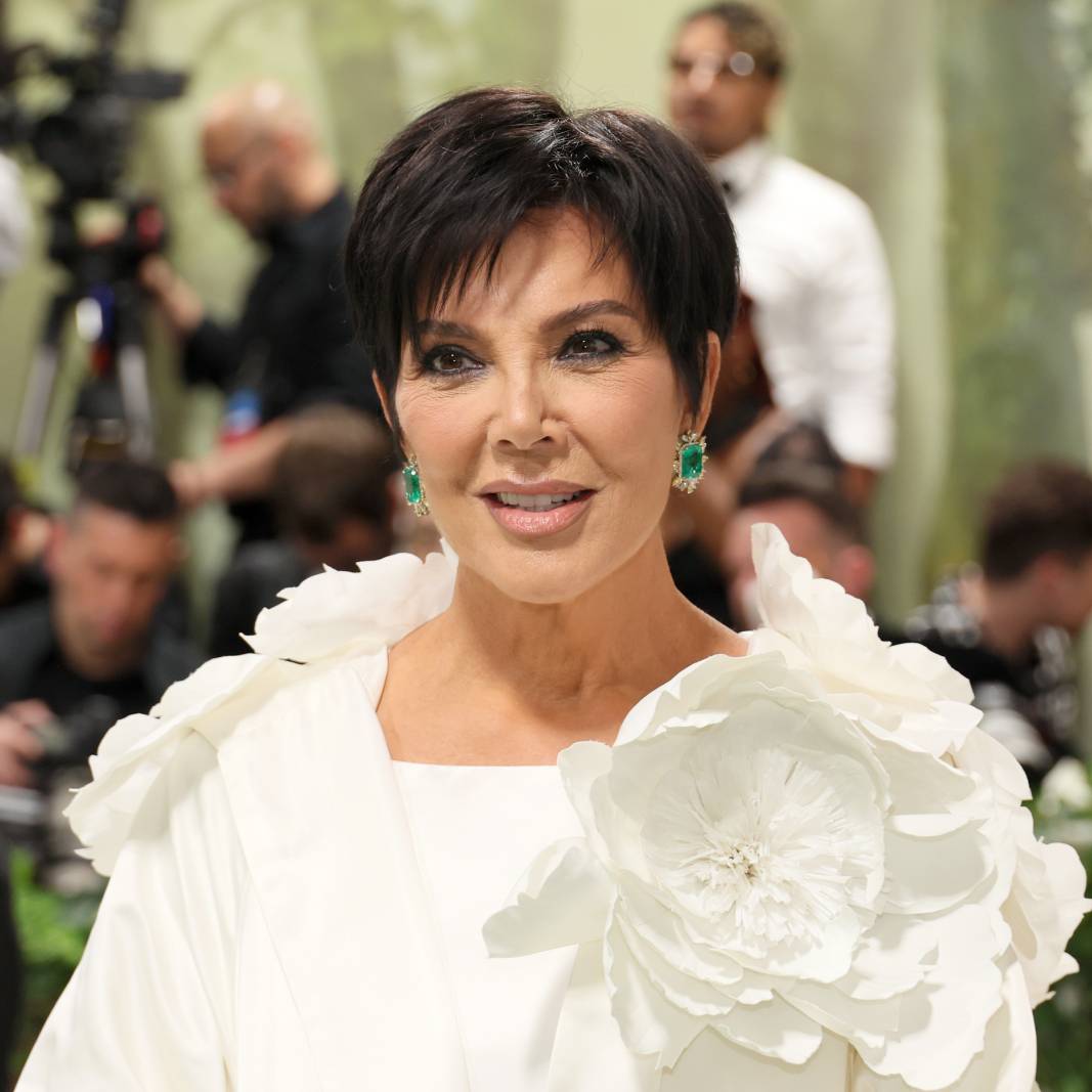 Close up of Kris Jenner in a white dress