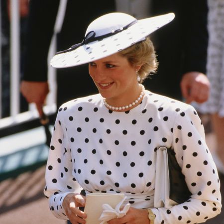 Princess Diana wearing a polka dot dress and hat
